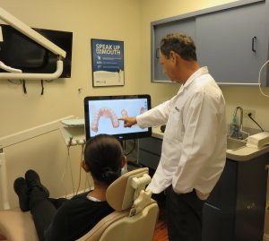 Doctor and young boy in examination room