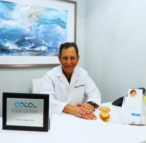 Dr. Brian Snyder sitting at his desk